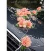 Decoratie voor trouwauto oranje bloemen