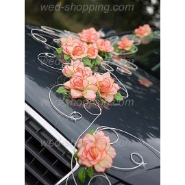Decoratie voor trouwauto oranje bloemen