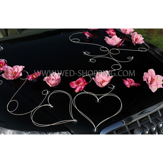 Trouwauto versiering roze magnolias en orchideeën