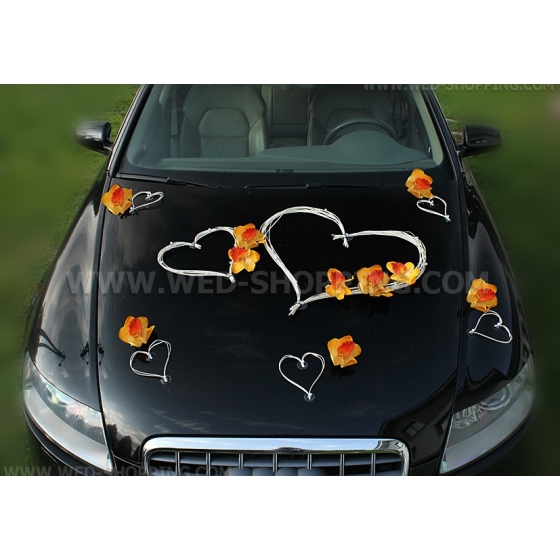 Witte harten trouwauto versiering oranje orchideeën DEK1403