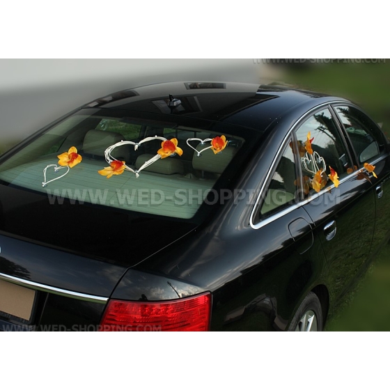 Witte harten trouwauto versiering oranje orchideeën DEK1403